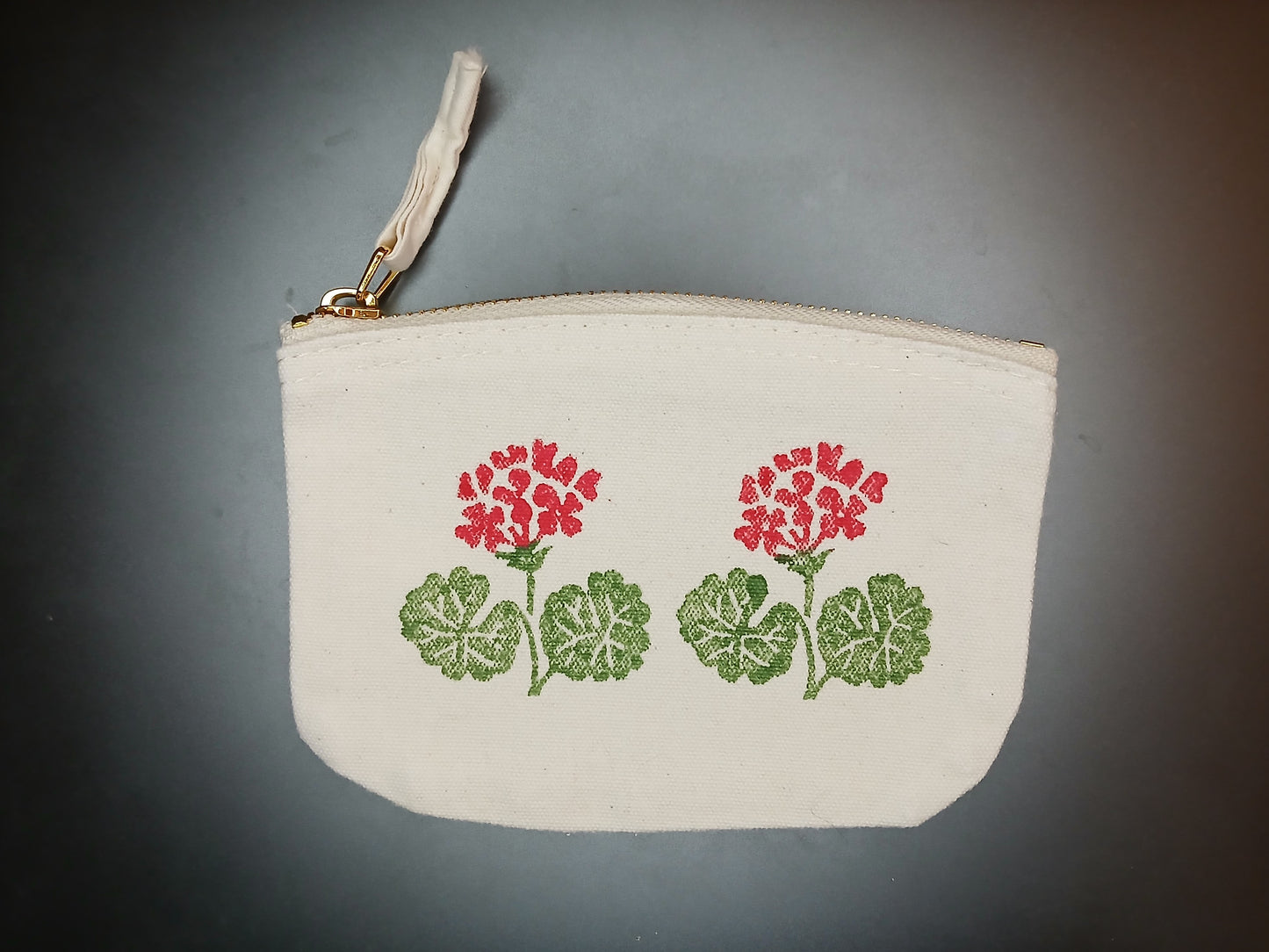 Geraniums in red & green on natural cotton purse