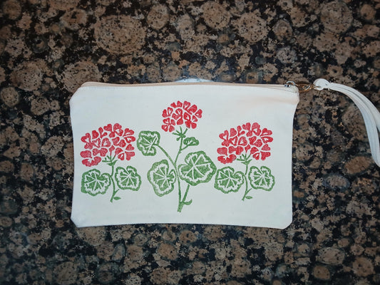 Geraniums in red & green on natural cotton canvas pouch