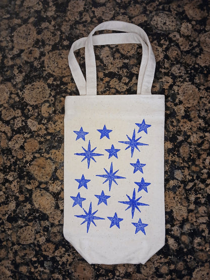 Stars in blue on natural cotton canvas bottle bag