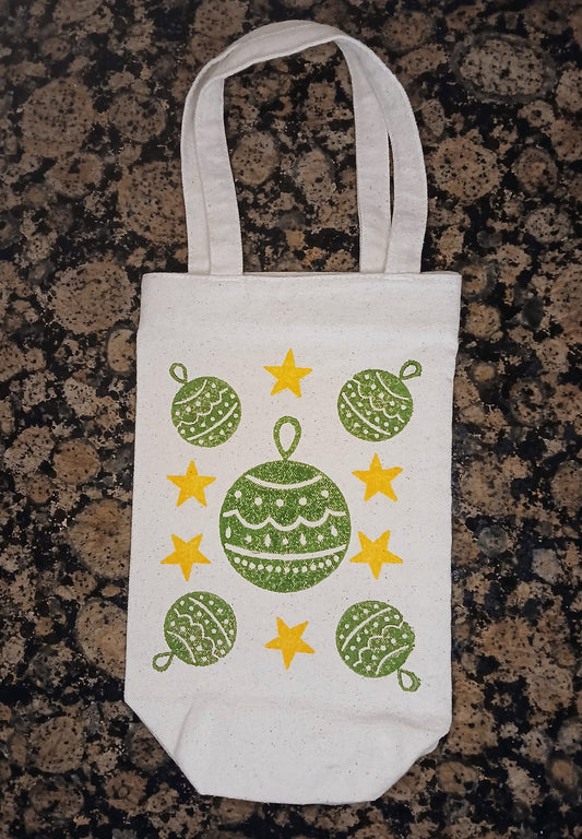 Christmas Baubles & Stars in green & yellow on natural cotton canvas bottle bag