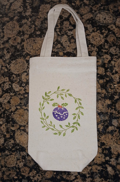 Wreath & Christmas Pudding in green & purple/green/red on natural cotton canvas bottle bag