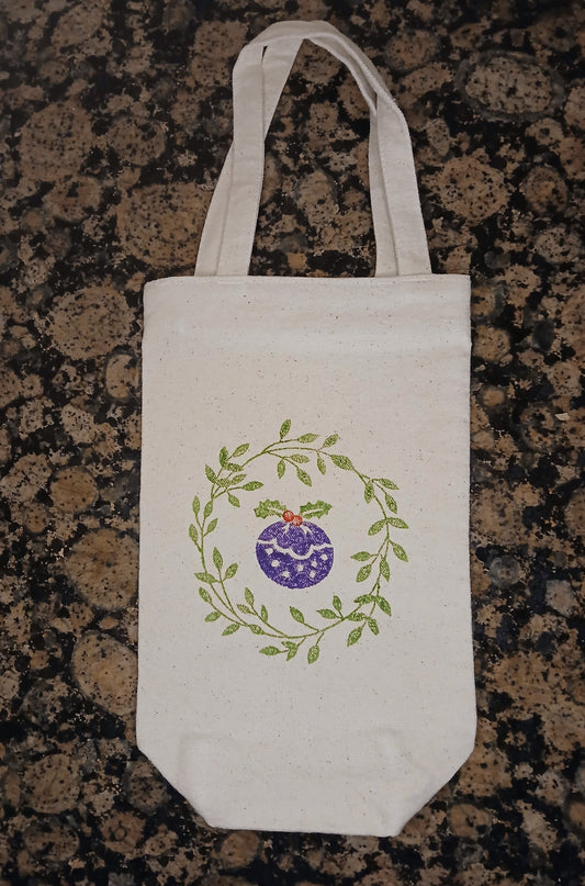 Wreath & Christmas Pudding in green & purple/green/red on natural cotton canvas bottle bag