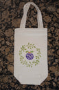 Wreath & Christmas Pudding in green & purple/green/red on natural cotton canvas bottle bag