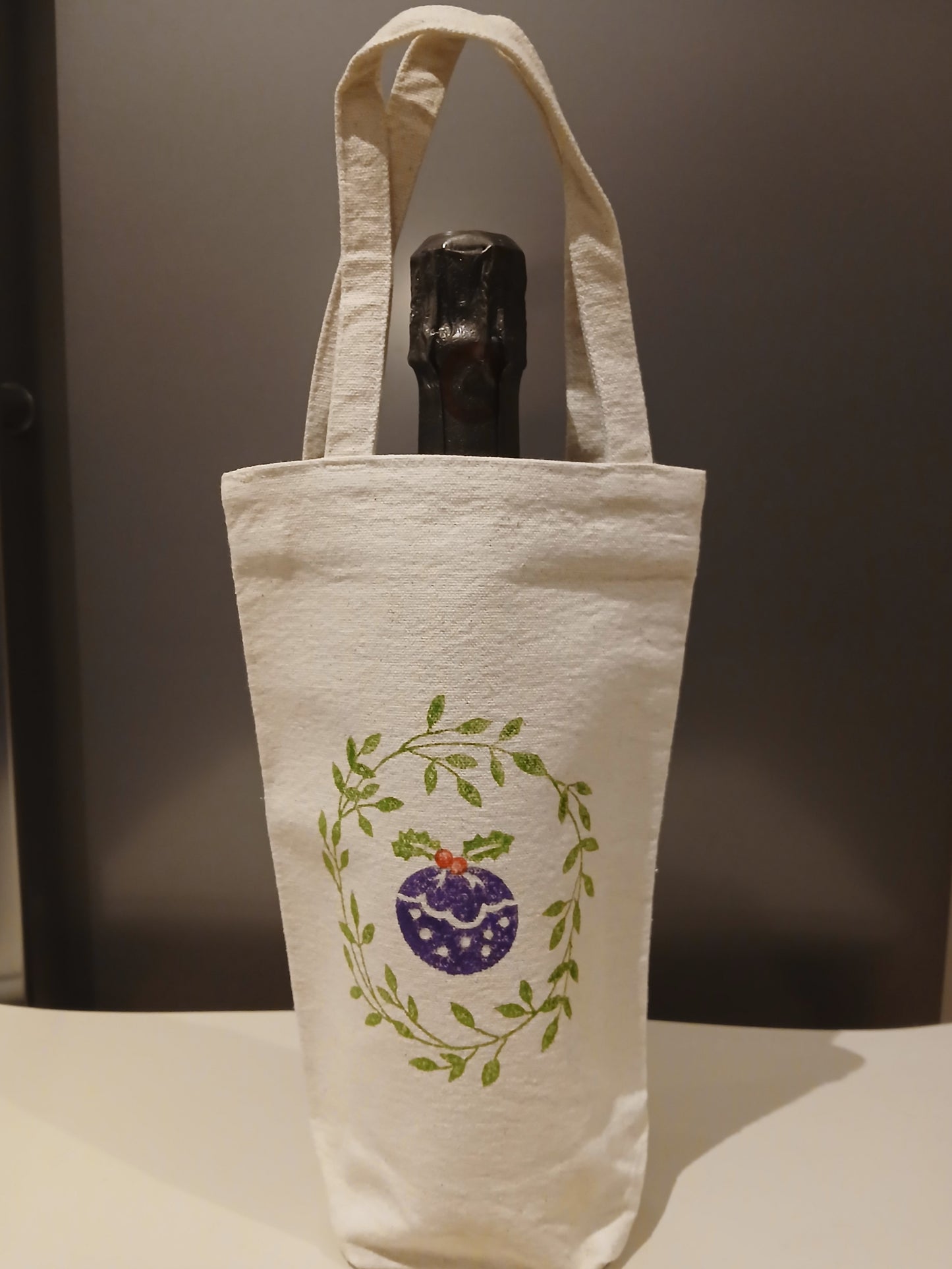 Wreath & Christmas Pudding in green & purple/green/red on natural cotton canvas bottle bag