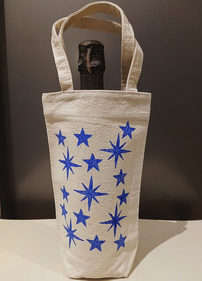 Stars in blue on natural cotton canvas bottle bag
