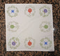 Christmas Wreaths on white cotton napkin