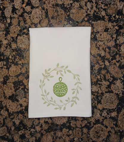 Christmas Wreaths on white cotton napkin