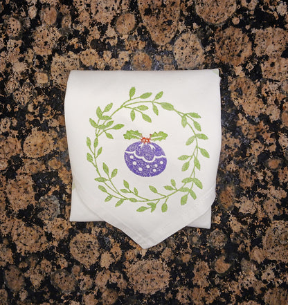 Christmas Wreaths on white cotton napkin