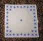 Stars in blue on white cotton napkin