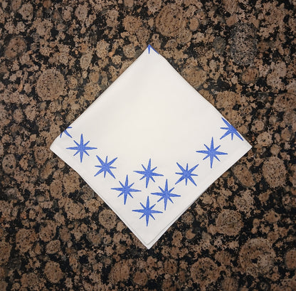 Stars in blue on white cotton napkin