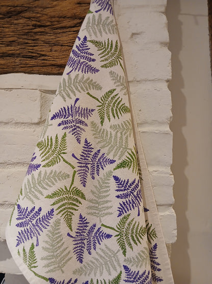 Ferns in two greens & purple on cotton teatowel
