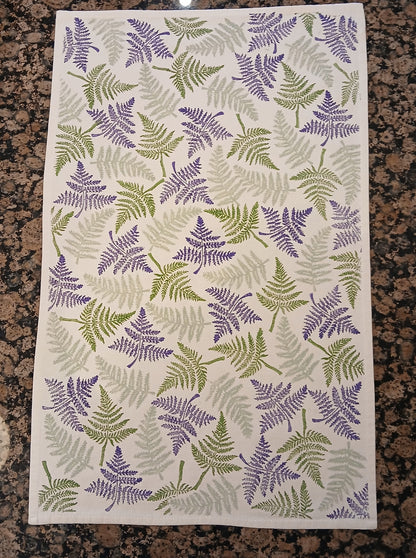 Ferns in two greens & purple on cotton teatowel