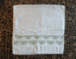 Bees in pale green on cotton hand towel