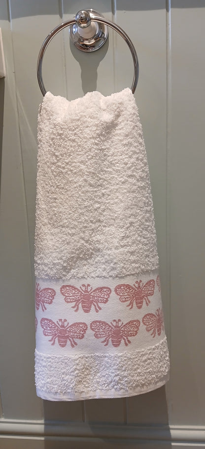 Bees in rose pink on cotton hand towel