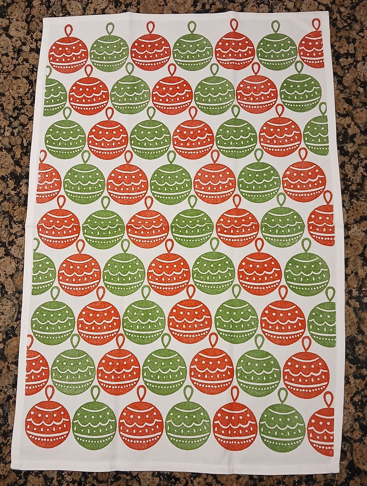 Christmas Baubles in red & green on cotton teatowel